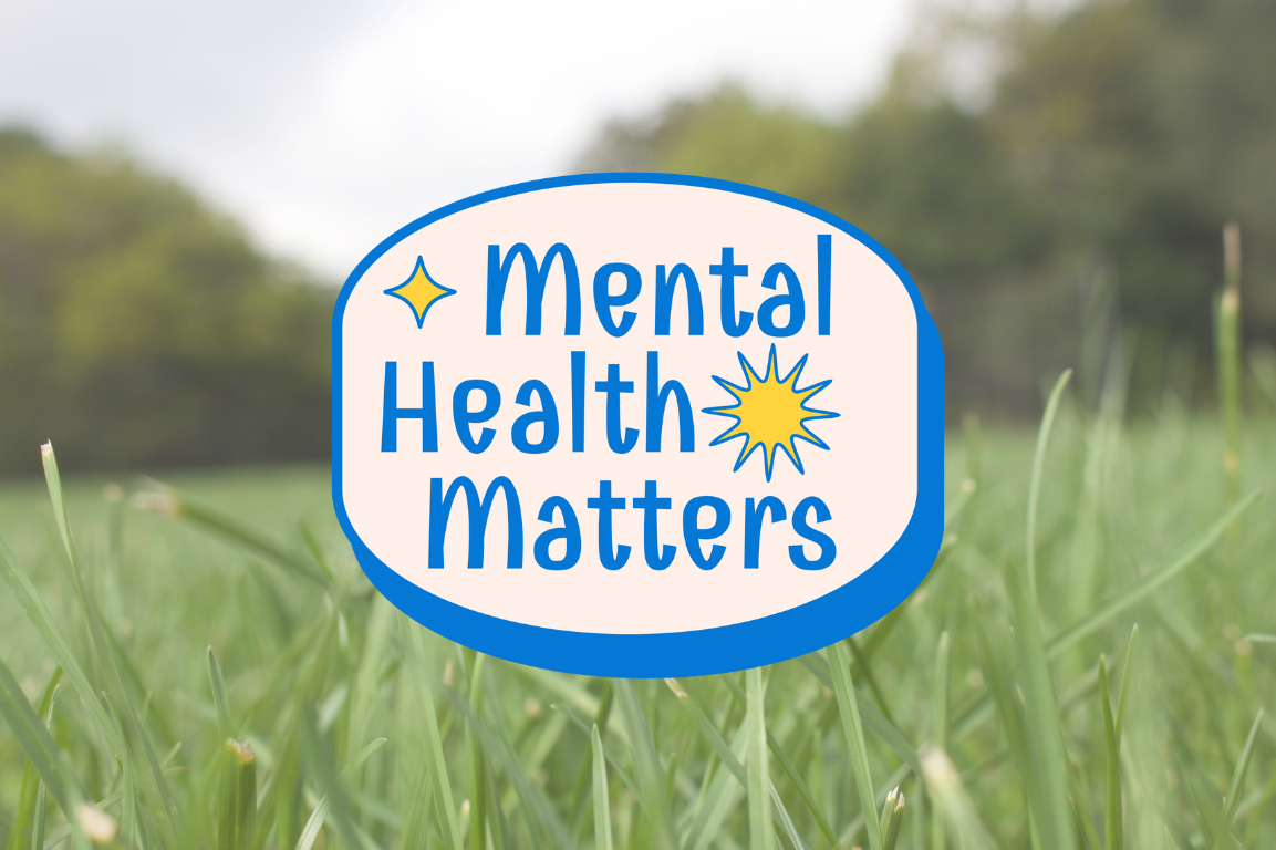 Mental Health Matters sign over grass background.